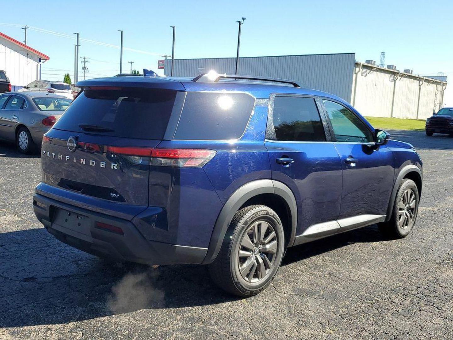 2022 Deep Ocean Blue Pearl /Charcoal Nissan Pathfinder SV (5N1DR3BA6NC) with an 3.5L V6 DOHC 24V engine, CVT transmission, located at 234 Columbia Ave, Battle Creek, MI, 49015, (269) 222-0088, 42.298264, -85.192543 - <b>Vehicle Details</b><br>Get ready to elevate your driving experience with this exceptional 2022 Nissan Pathfinder SV! This immaculate SUV is the perfect blend of power, technology, and comfort, designed to meet all your driving needs. Under the hood, you'll find a robust V6, 3.5L engine paired wit - Photo#1