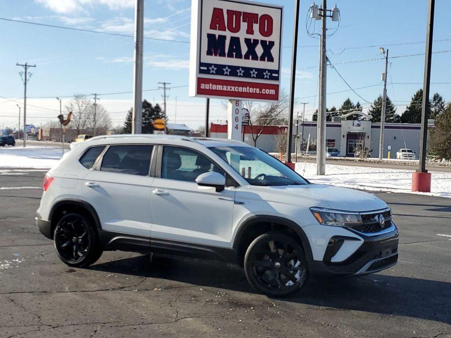 2022 Pure White /Black Volkswagen Taos SE (3VVTX7B29NM) with an 1.5L L4 SFI DOHC 16V engine, 8-speed automatic transmission, located at 6064 Gull Rd, Kalamazoo, MI, 49048, (269) 222-0088, 42.328388, -85.512924 - This 2022 Volkswagen Taos has automated speed control that adjusts to maintain a safe following distance, enhancing highway driving convenience. This unit comes equipped with Android Auto for seamless smartphone integration on the road. Apple CarPlay: Seamless smartphone integration for this small s - Photo#0