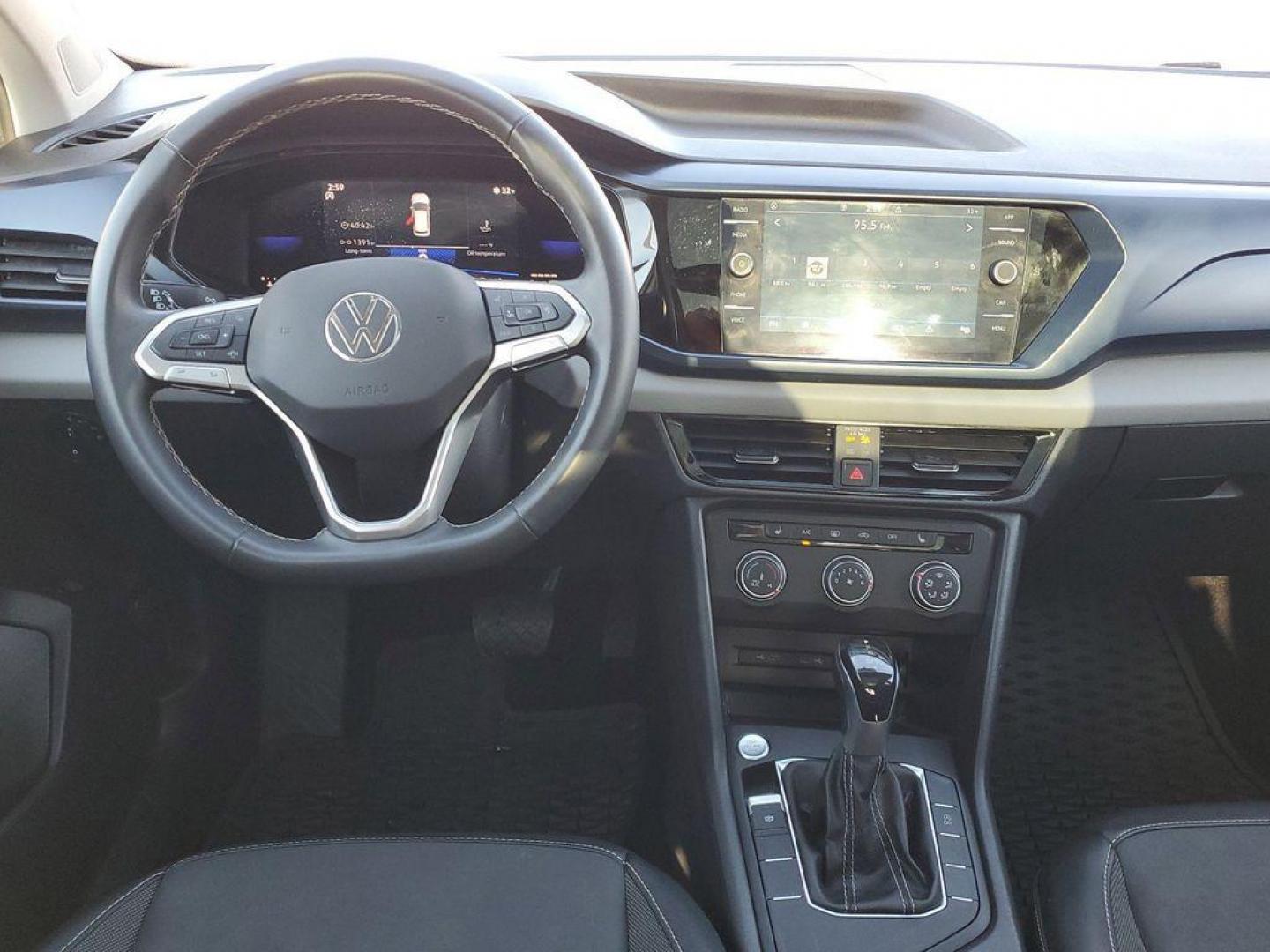 2022 Pure White /Black Volkswagen Taos SE (3VVTX7B29NM) with an 1.5L L4 SFI DOHC 16V engine, 8-speed automatic transmission, located at 6064 Gull Rd, Kalamazoo, MI, 49048, (269) 222-0088, 42.328388, -85.512924 - This 2022 Volkswagen Taos has automated speed control that adjusts to maintain a safe following distance, enhancing highway driving convenience. This unit comes equipped with Android Auto for seamless smartphone integration on the road. Apple CarPlay: Seamless smartphone integration for this small s - Photo#26