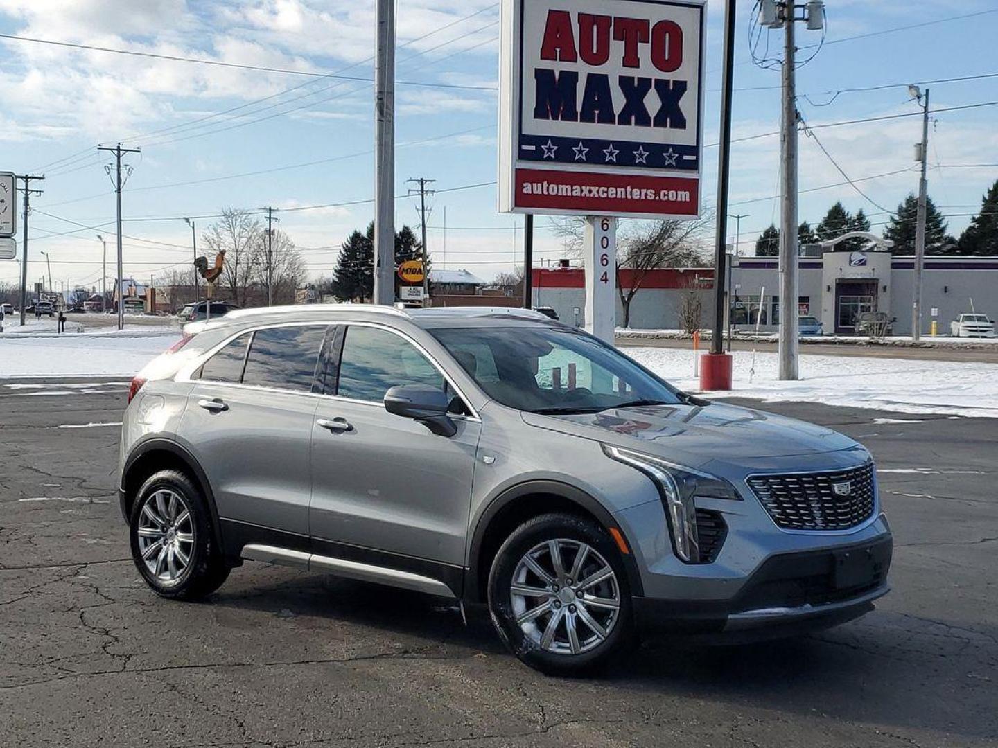 2023 Argent Silver Metallic /Jet Black Cadillac XT4 Premium Luxury AWD (1GYFZDR4XPF) with an 2.0L L4 DOHC 16V engine, 9A transmission, located at 6064 Gull Rd, Kalamazoo, MI, 49048, (269) 222-0088, 42.328388, -85.512924 - <b>Vehicle Details</b><br>Introducing the 2023 Cadillac XT4 AWD Premium Luxuryan exceptional blend of style, performance, and sophistication, now available for you to own! With just 48,064 miles, this one-owner beauty has been meticulously maintained, offering a premium driving experience that stand - Photo#0