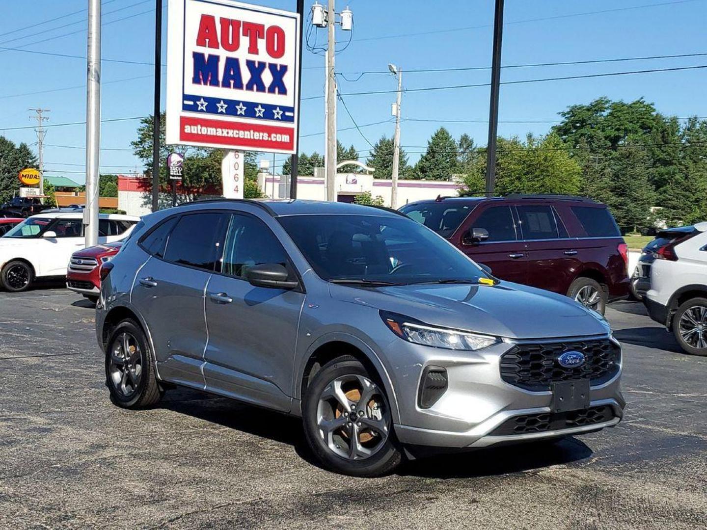 2023 Iconic Silver Metallic /Ebony Ford Escape ST-Line AWD (1FMCU9MN5PU) with an 1.5L L3 engine, 8A transmission, located at 234 Columbia Ave, Battle Creek, MI, 49015, (269) 222-0088, 42.298264, -85.192543 - <b>Vehicle Details</b><br>Looking for a reliable and stylish SUV? Check out this 2023 Ford Escape ST Line with only 24,006 miles, available now at our dealership. This well-maintained vehicle comes with a CARFAX 1-Owner report, ensuring you are getting a quality car with a clean history. Equipped w - Photo#0