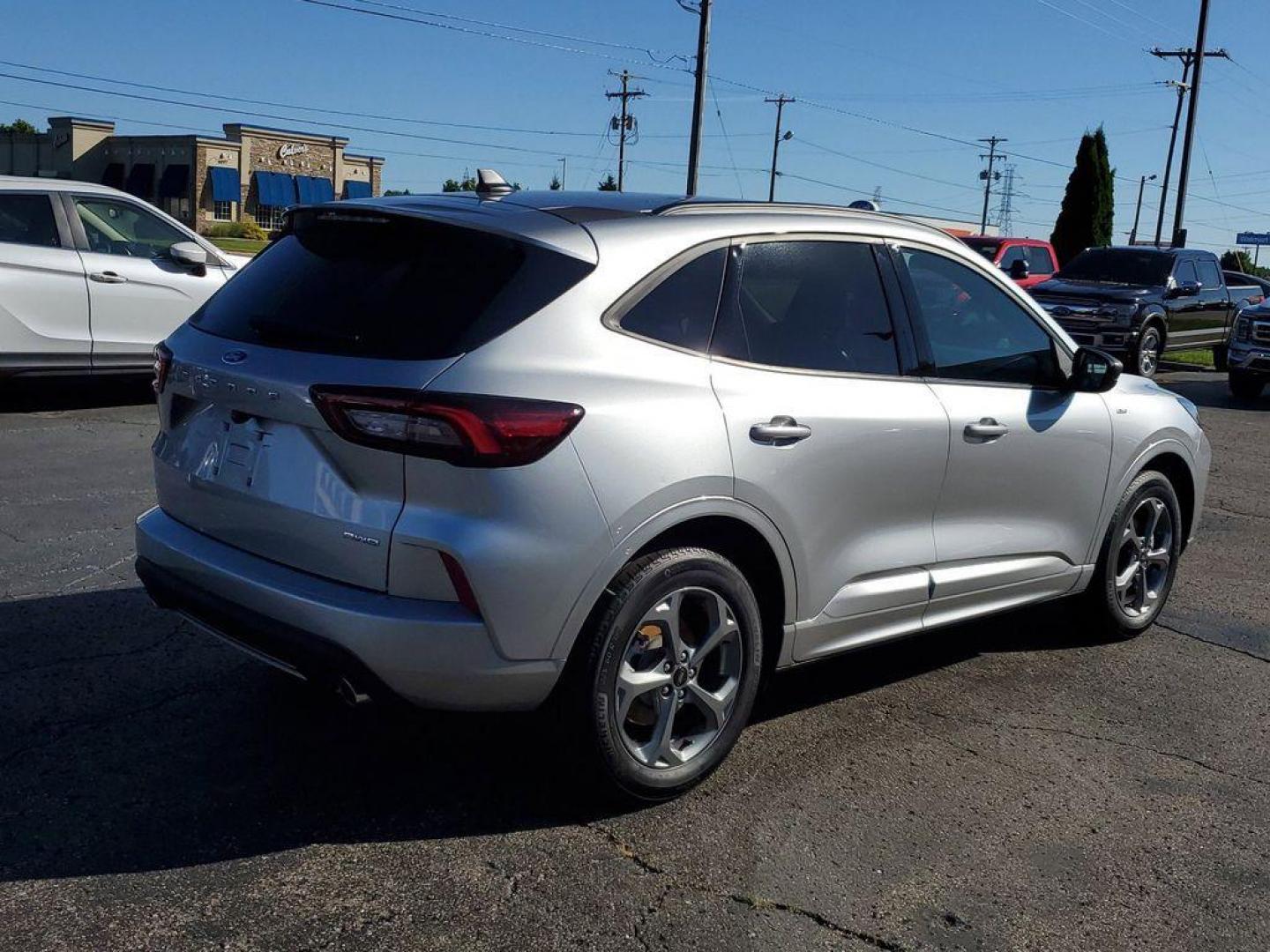 2023 Iconic Silver Metallic /Ebony Ford Escape ST-Line AWD (1FMCU9MN5PU) with an 1.5L L3 engine, 8A transmission, located at 234 Columbia Ave, Battle Creek, MI, 49015, (269) 222-0088, 42.298264, -85.192543 - <b>Vehicle Details</b><br>Looking for a reliable and stylish SUV? Check out this 2023 Ford Escape ST Line with only 24,006 miles, available now at our dealership. This well-maintained vehicle comes with a CARFAX 1-Owner report, ensuring you are getting a quality car with a clean history. Equipped w - Photo#1